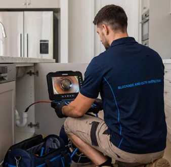 Clearing a blocked sink at a Annandale property